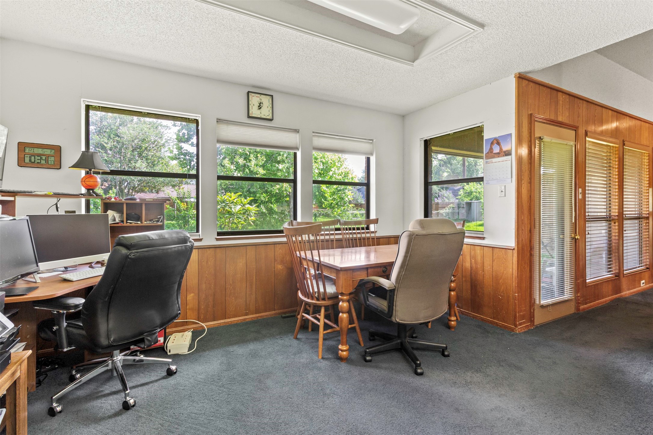 206 Stanford Road Lake Jackson, TX 77566 - Photo 17 of 26 a view of a workspace with furniture and a window