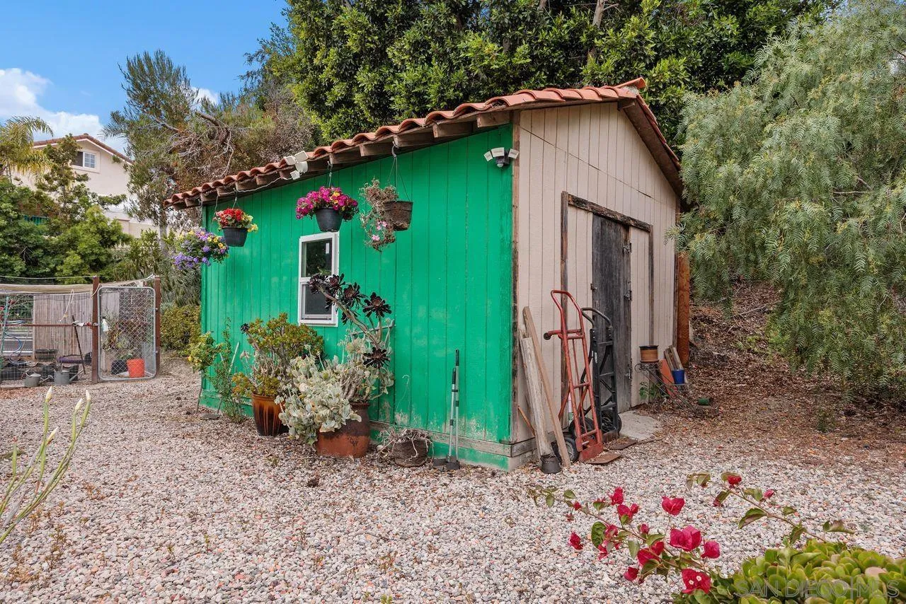 2238 Oceanview Road Oceanside, CA 92056 - Photo 24 of 50 a front view of a house with garden