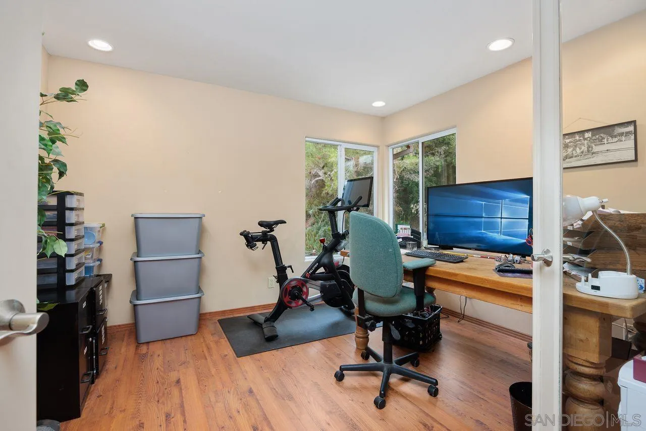 2238 Oceanview Road Oceanside, CA 92056 - Photo 37 of 50 a view of a workspace with furniture and gym equipment