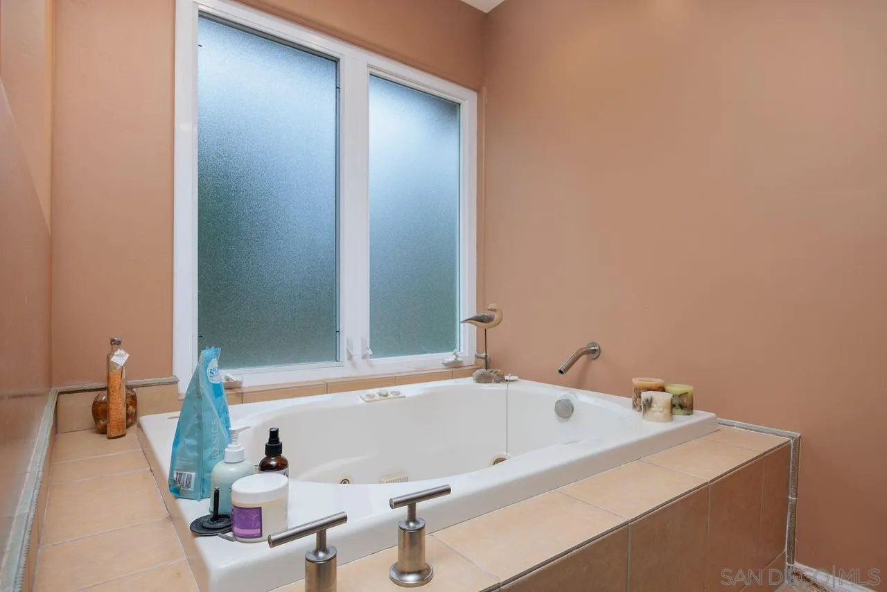2238 Oceanview Road Oceanside, CA 92056 - Photo 39 of 50 a bathroom with a tub and a sink