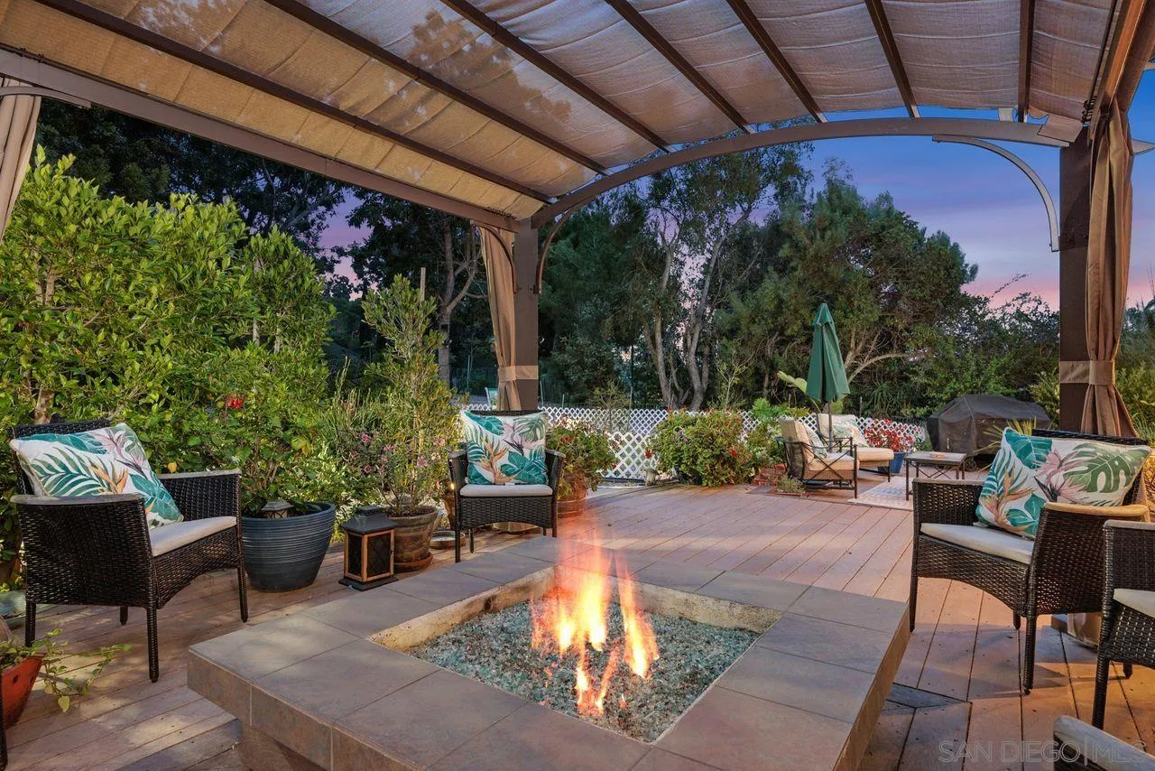 2238 Oceanview Road Oceanside, CA 92056 - Photo 48 of 50 a view of a chairs and table in a patio