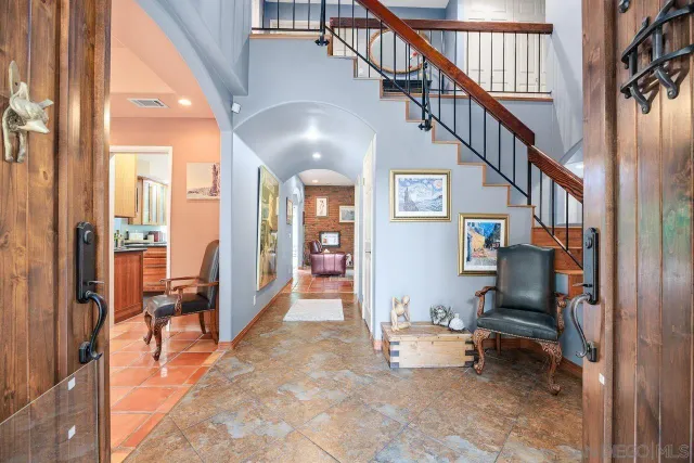 a view of entryway livingroom and hall