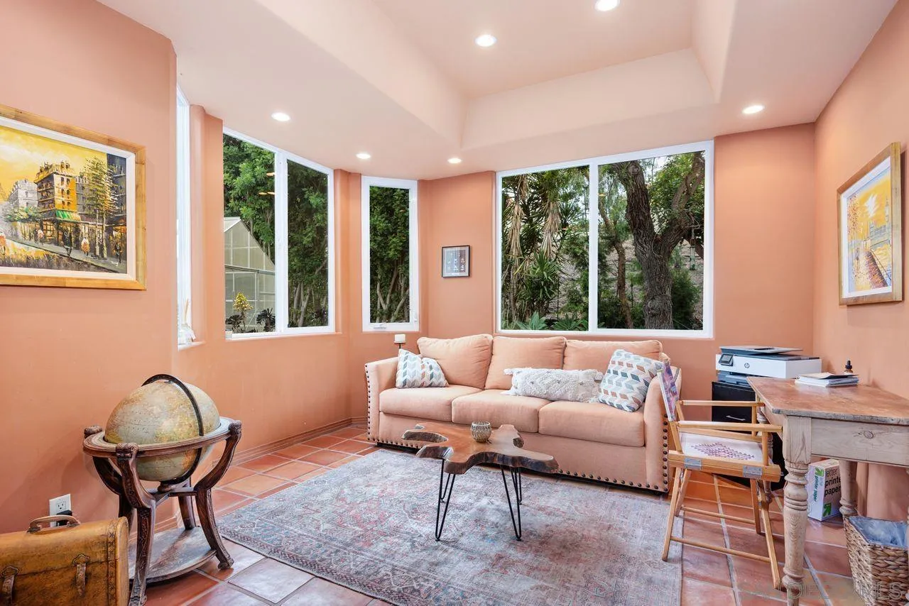 2238 Oceanview Road Oceanside, CA 92056 - Photo 9 of 50 a living room with furniture and a large window