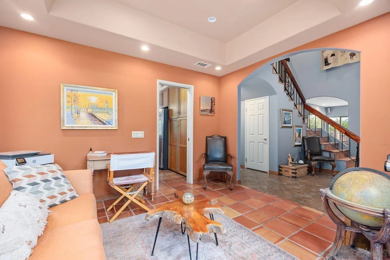 2238 Oceanview Road Oceanside, CA 92056 - Photo 10 of 50 a outdoor space with lots of chairs and mirrors