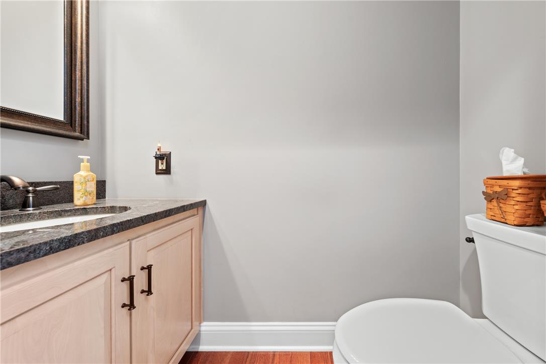 4568 Greenfield Road Bethlehem, PA 18017 - Photo 21 of 59 Refined wood cabinetry and a rich granite counter define this elegant powder room vanity.