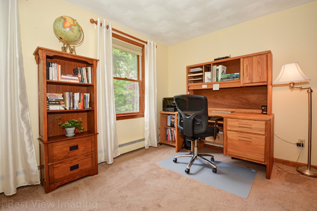 230 Stone School Road Sutton, MA 01590 - Photo 12 of 27 a view of a workspace with furniture