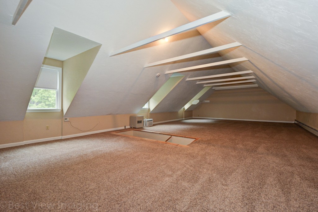 230 Stone School Road Sutton, MA 01590 - Photo 17 of 27 an empty room with windows