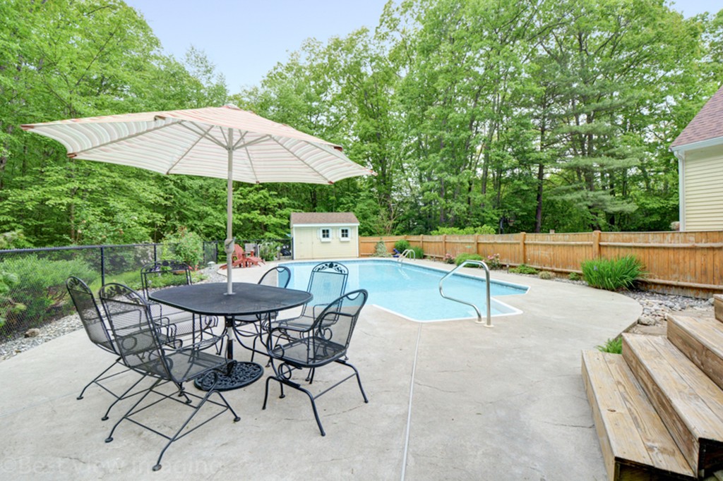 230 Stone School Road Sutton, MA 01590 - Photo 27 of 27 a view of backyard with seating space and trees