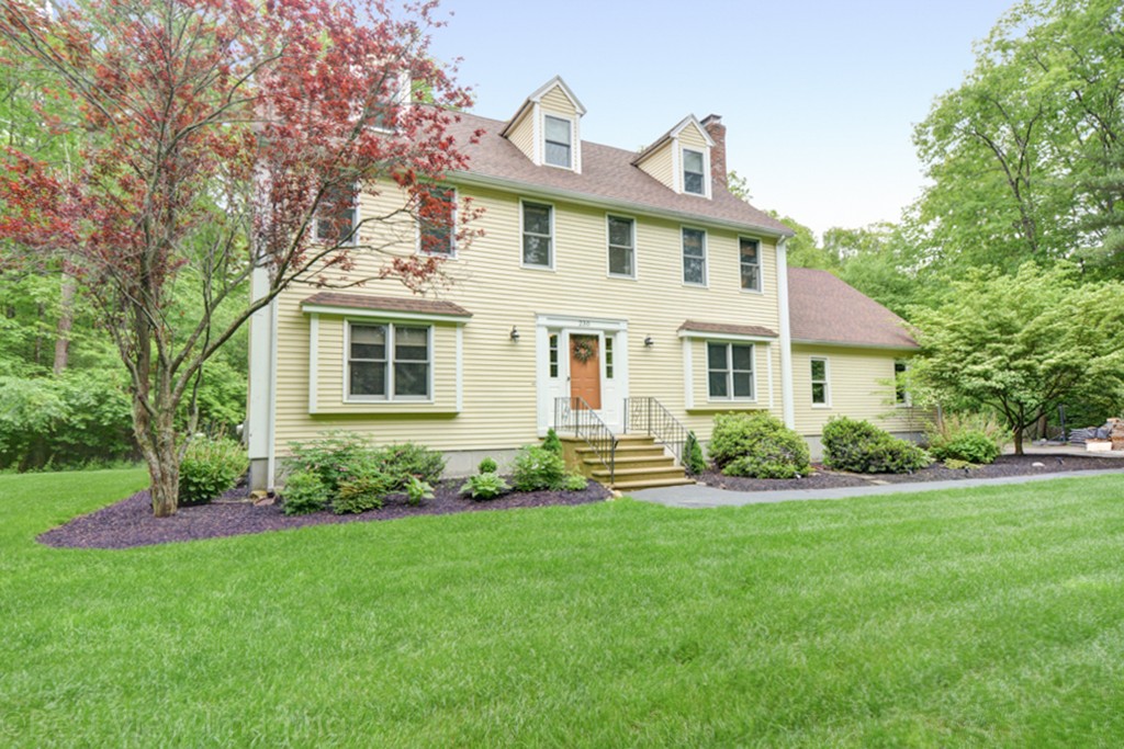 230 Stone School Road Sutton, MA 01590 - Photo 3 of 27 a front view of a house with a garden