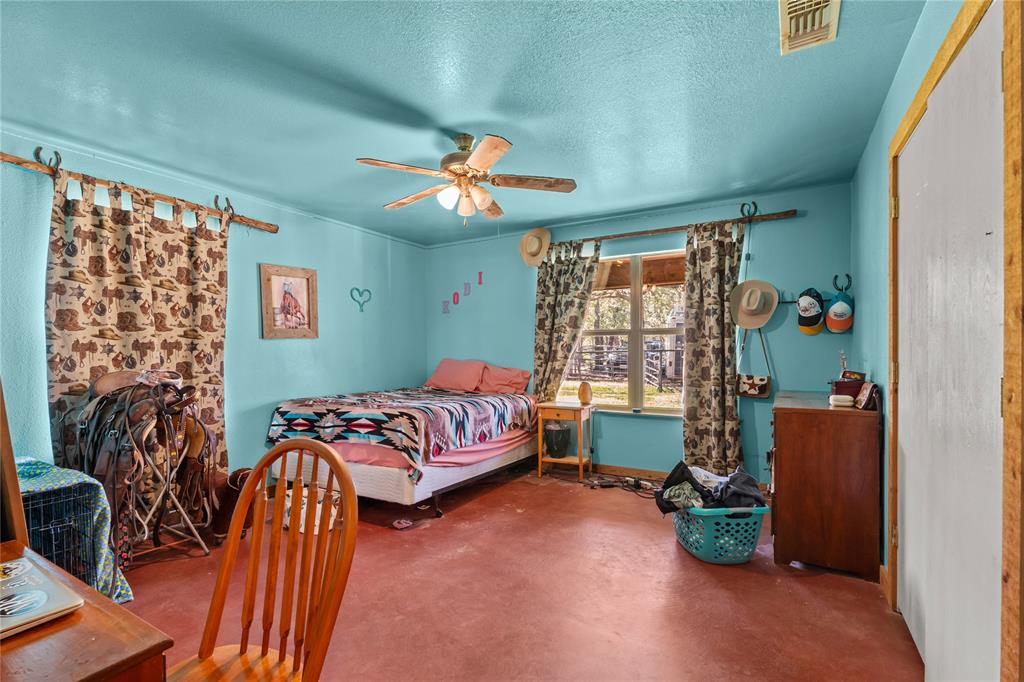 262 North Cheyenne Springtown, TX 76082 - Photo 15 of 35 a bedroom with furniture and a window