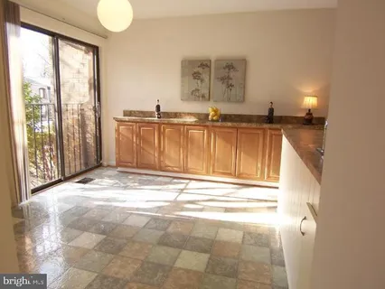 a view of a bathroom with a sink and a window
