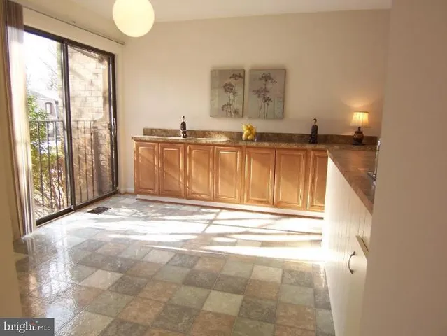 a view of a bathroom with a sink and a window