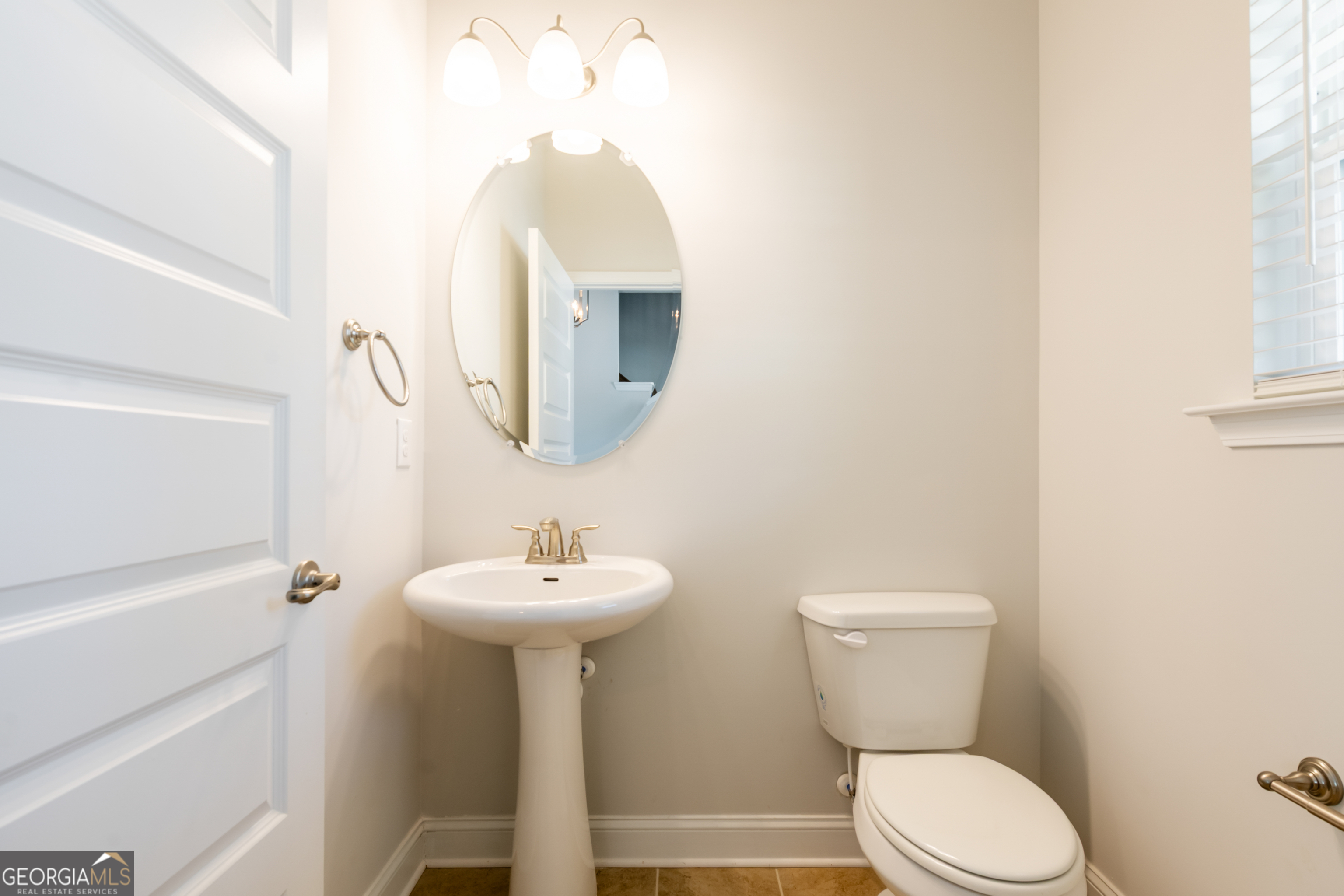229 Carsons Walk Macon, GA 31206 - Photo 22 of 43 a bathroom with a sink toilet and a mirror