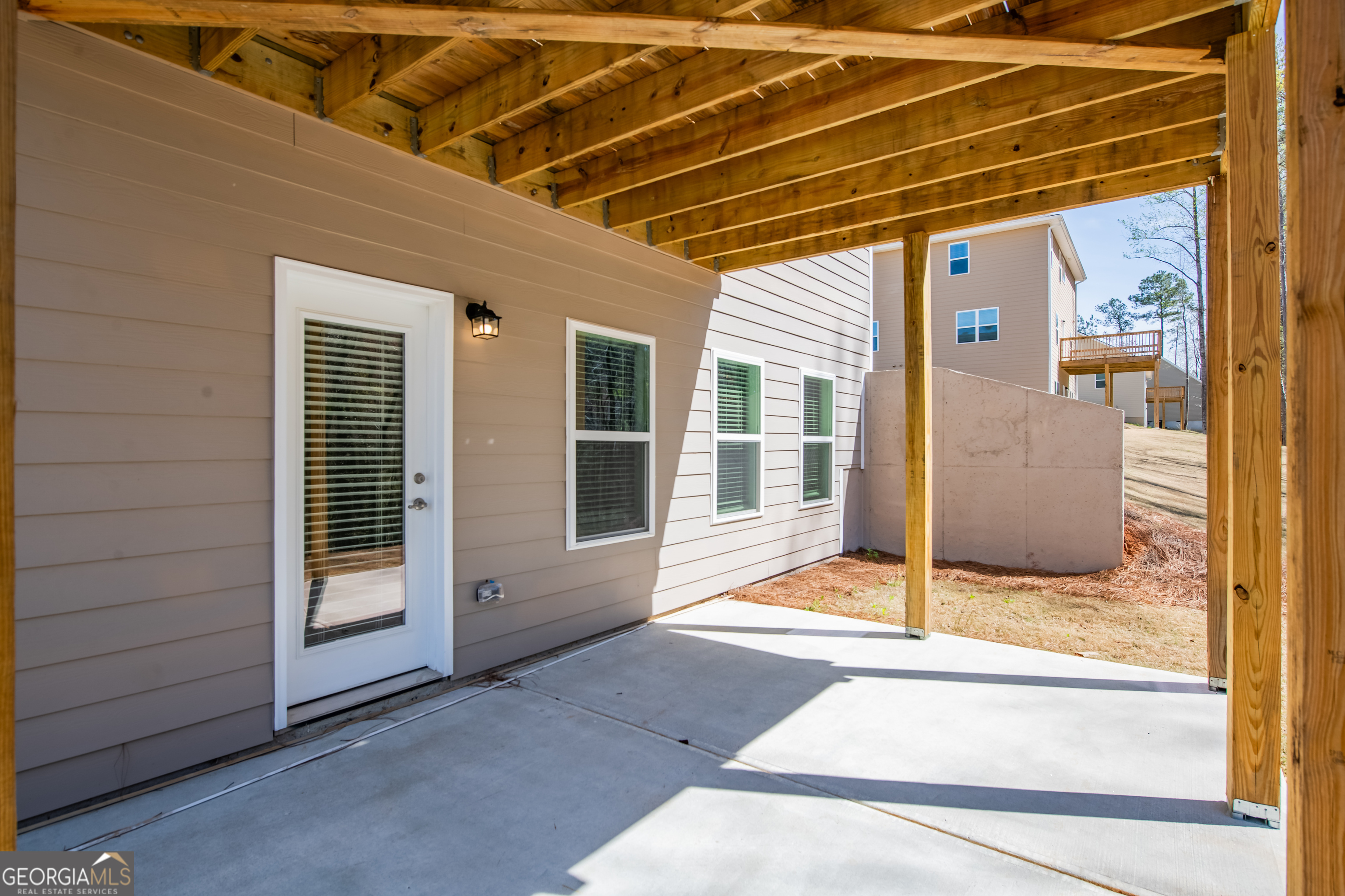 229 Carsons Walk Macon, GA 31206 - Photo 38 of 43 a view of a porch with a door