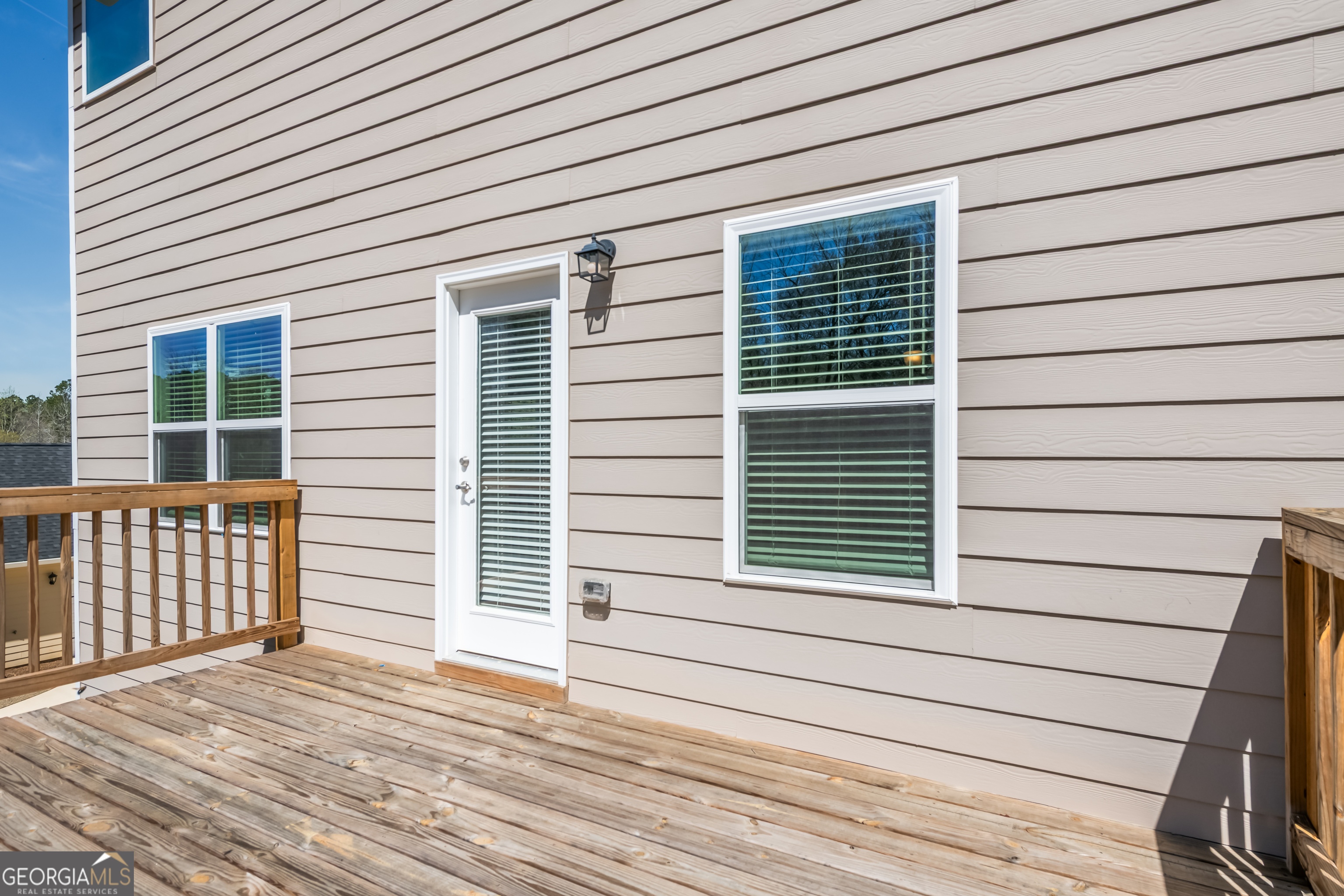 229 Carsons Walk Macon, GA 31206 - Photo 42 of 43 a view of a wooden balcony