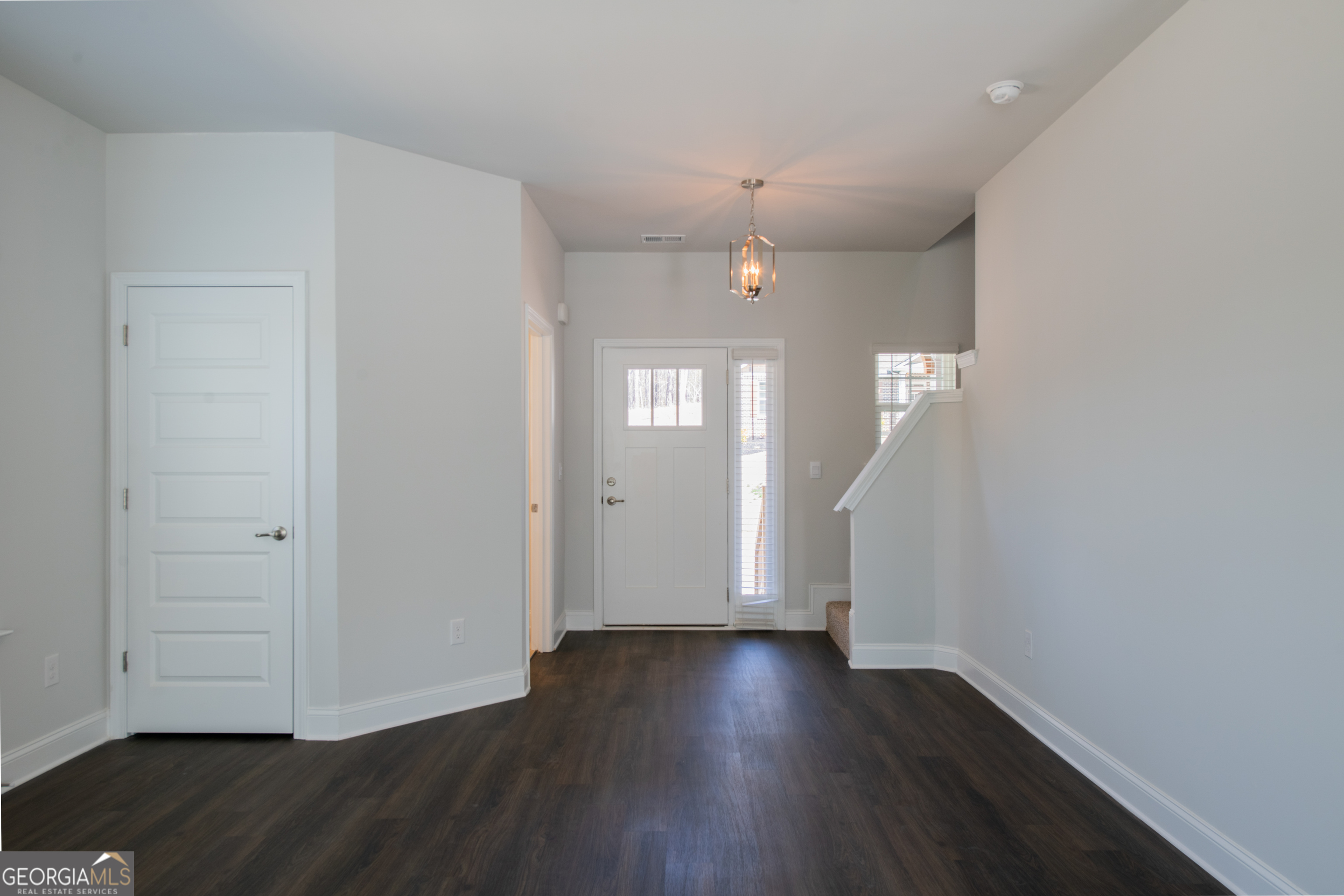 229 Carsons Walk Macon, GA 31206 - Photo 10 of 43 an empty room with wooden floor and window