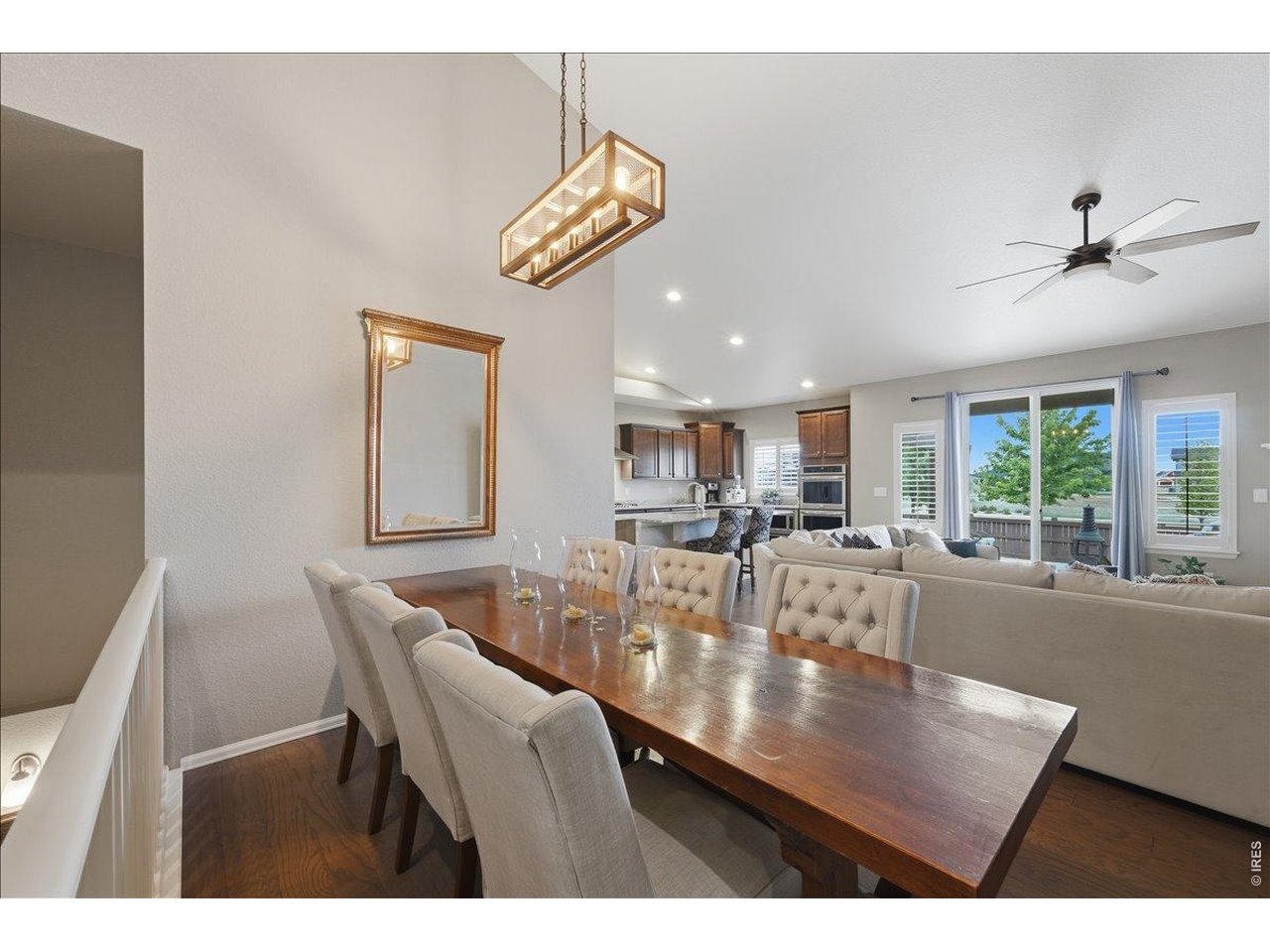 6096 Story Road Timnath, CO 80547 - Photo 6 of 50 a view of a dining room with furniture and a large window