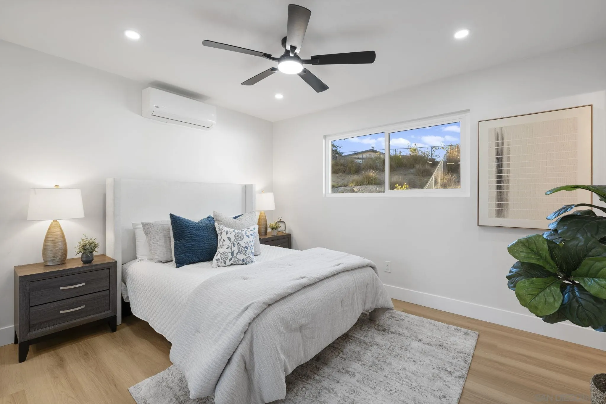 13442 Mountainside Drive Poway, CA 92064 - Photo 11 of 18 a bedroom with furniture and a window