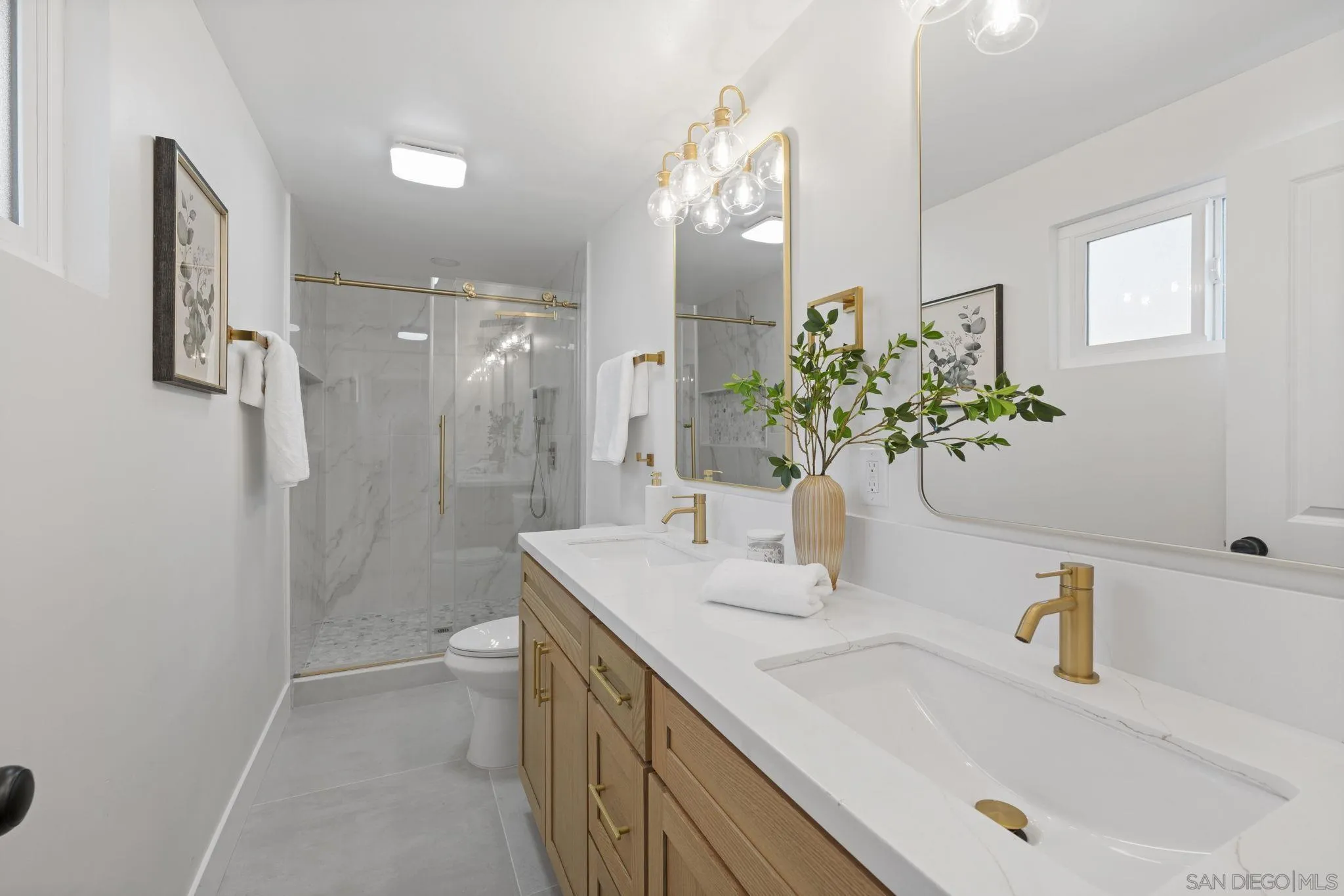 13442 Mountainside Drive Poway, CA 92064 - Photo 10 of 18 a bathroom with a sink and a mirror