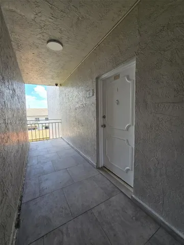 a view of a livingroom with a furniture
