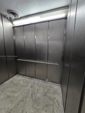 a view of a patio with swimming pool