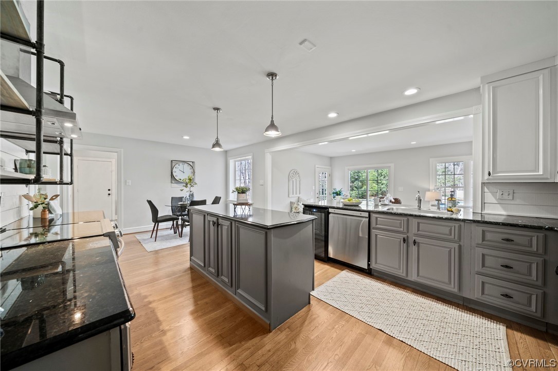 2039 Albion Road Midlothian, VA 23113 - Photo 13 of 49 a open kitchen with stainless steel appliances granite countertop a lot of counter space and wooden floor