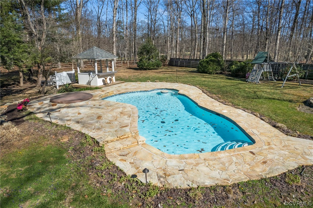 2039 Albion Road Midlothian, VA 23113 - Photo 45 of 49 a view of a backyard with a fountain