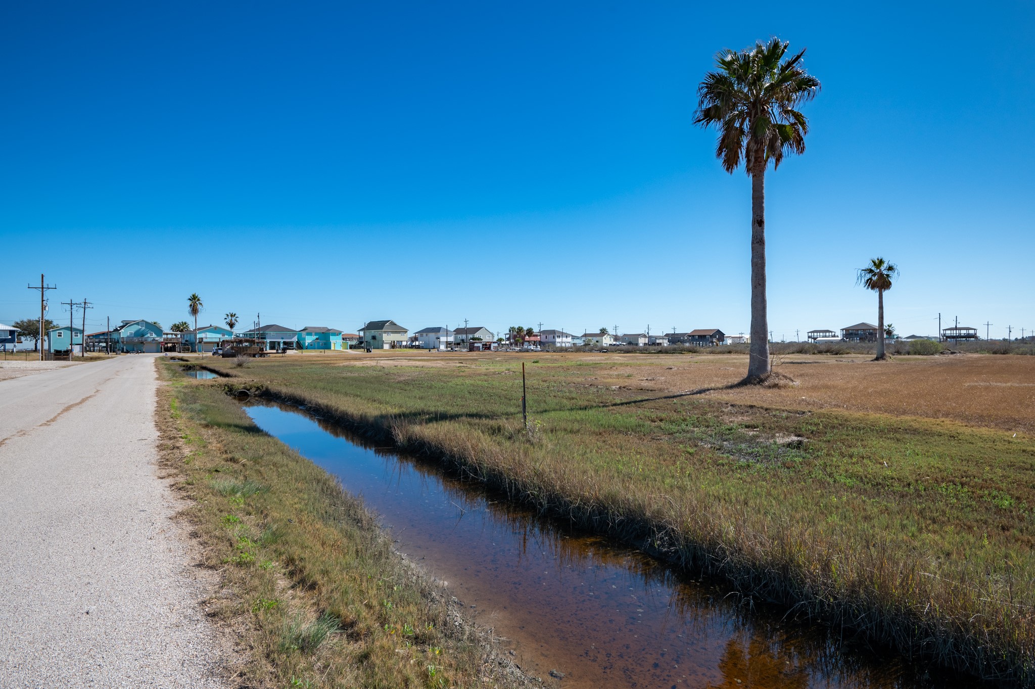 4454 Boyt Road Port Bolivar, TX 77650 - Photo 3 of 14 a view of a lake with a house