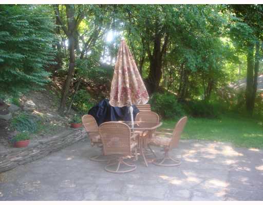210 Farmington Road Pittsburgh, PA 15215 - Photo 6 of 6 Patio/Deck. pretty stone patio off the back of the house
