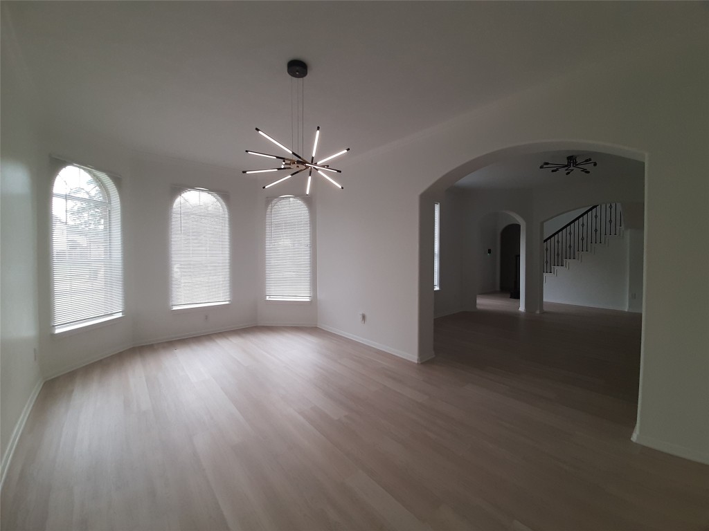 4214 Blue Sage Terrace Spring, TX 77388 - Photo 13 of 50 a view of a room with wooden floor and window