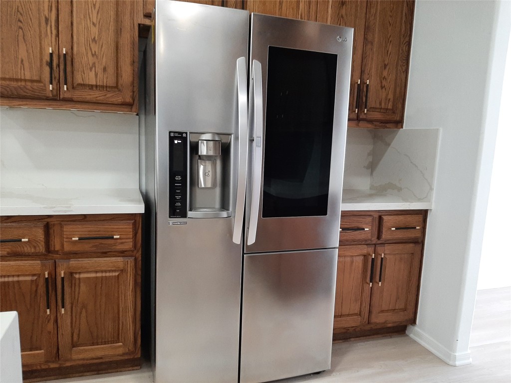 4214 Blue Sage Terrace Spring, TX 77388 - Photo 23 of 50 a refrigerator freezer sitting inside of a kitchen