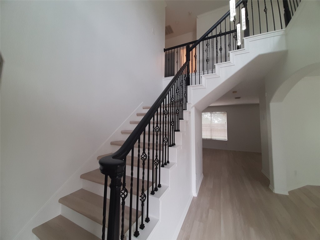 4214 Blue Sage Terrace Spring, TX 77388 - Photo 28 of 50 a view of entryway and hall with wooden floor