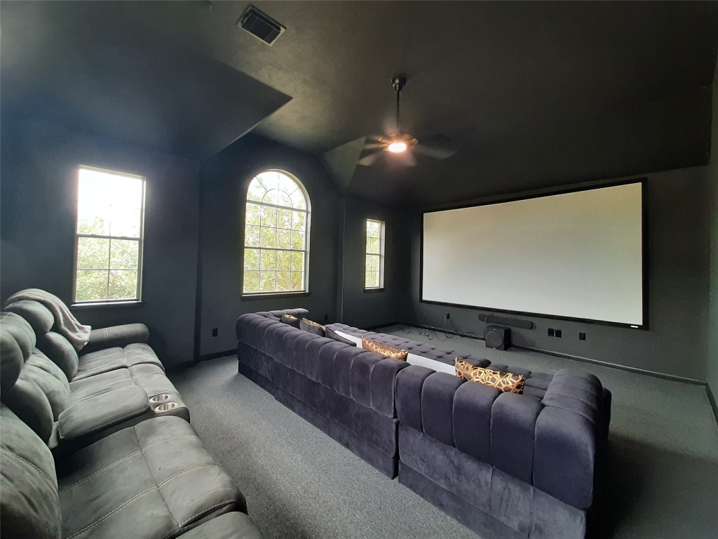 4214 Blue Sage Terrace Spring, TX 77388 - Photo 33 of 50 a living room with furniture and a flat screen tv