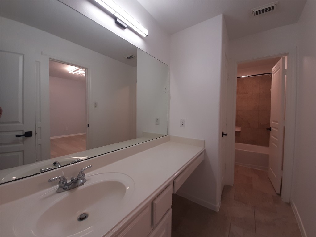 4214 Blue Sage Terrace Spring, TX 77388 - Photo 35 of 50 a bathroom with a sink and a mirror