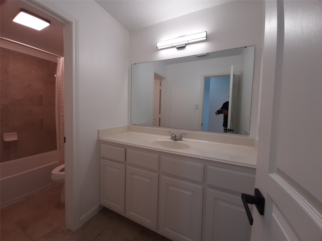 4214 Blue Sage Terrace Spring, TX 77388 - Photo 38 of 50 a bathroom with a double vanity sink and mirror