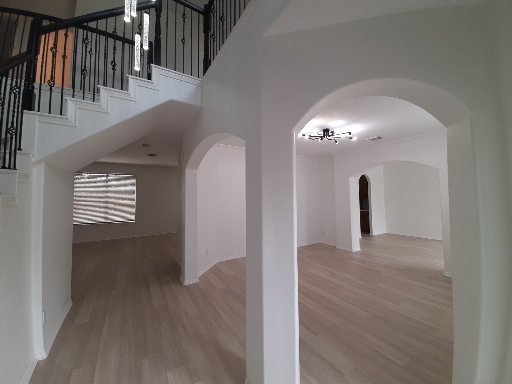 4214 Blue Sage Terrace Spring, TX 77388 - Photo 4 of 50 a view of a hallway with wooden floor