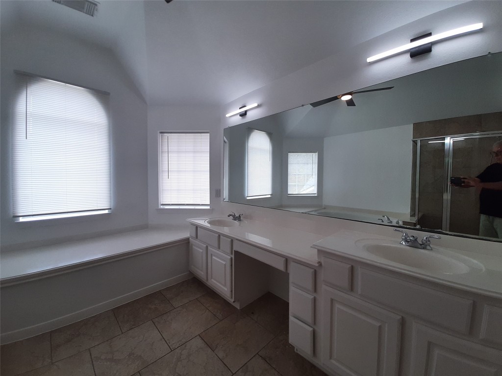 4214 Blue Sage Terrace Spring, TX 77388 - Photo 46 of 50 a bathroom with sinks mirror and a bathtub