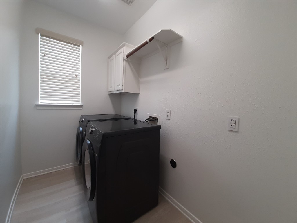 4214 Blue Sage Terrace Spring, TX 77388 - Photo 7 of 50 a view of storage and utility room with a window