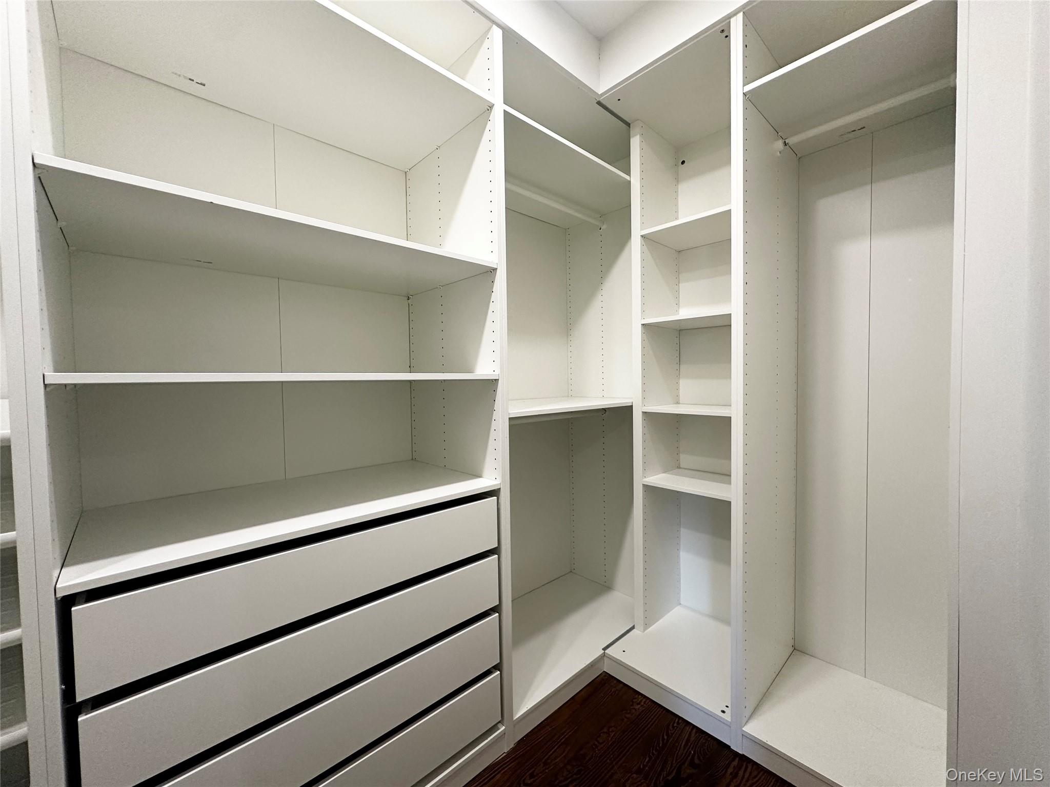 4810 Boston Post Road, Unit 4E Pelham, NY 10803 - Photo 14 of 26 a view of walk in closet with empty racks