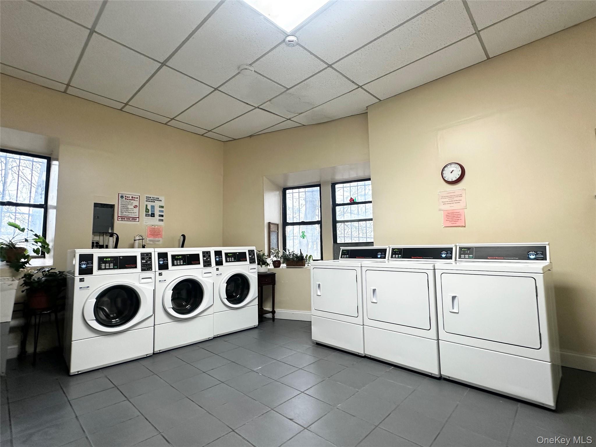 4810 Boston Post Road, Unit 4E Pelham, NY 10803 - Photo 18 of 26 a utility room with dryer and washer