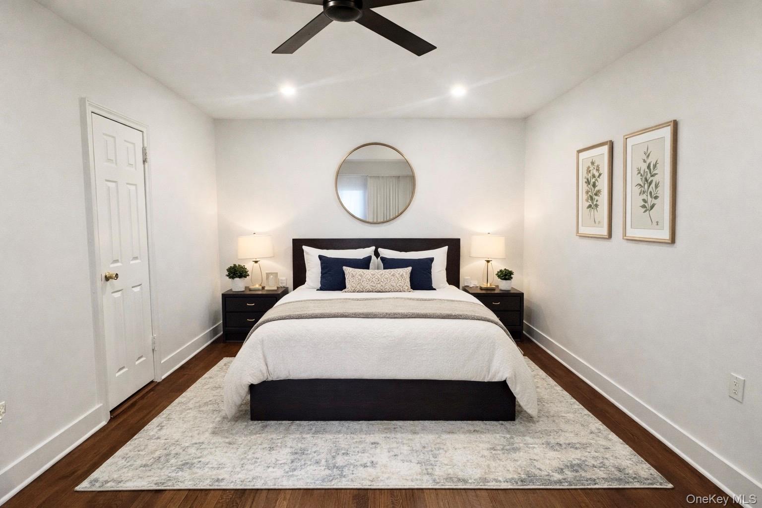 4810 Boston Post Road, Unit 4E Pelham, NY 10803 - Photo 10 of 26 a bedroom with a bed and wooden floor