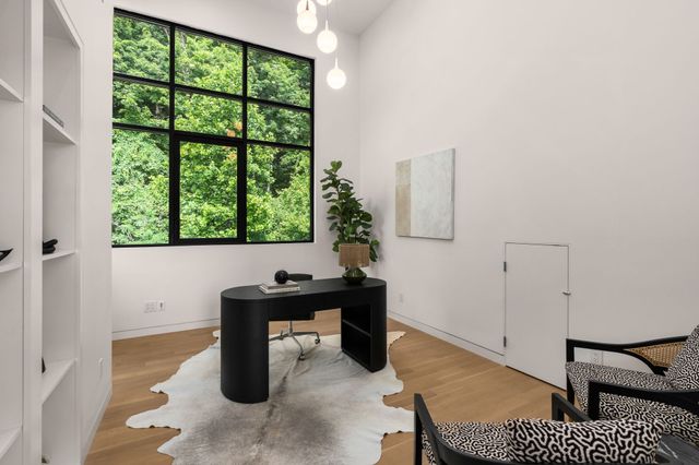 a view of a house with swimming pool