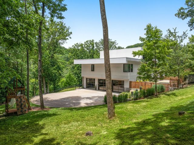 a view of a city and mountains in the background