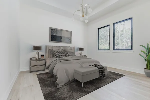 a bedroom with bed and window
