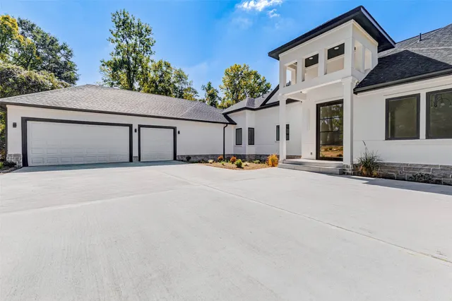 a view of a house with a street