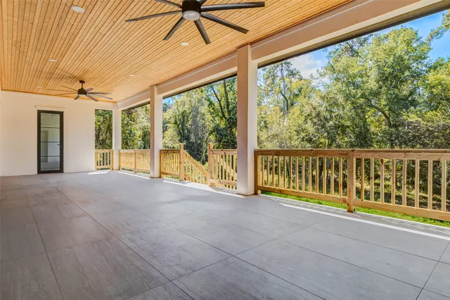 a view of a room with wooden floor and iron walls