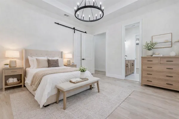 a bedroom with a bed and closet