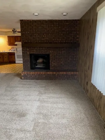 a living room with a fireplace