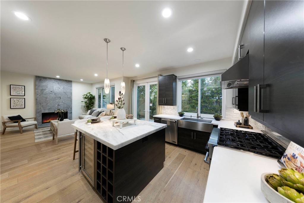 43 Lessay Newport Coast, CA 92657 - Photo 11 of 29 Remodeled kitchen boasting quality appliances and finishes.