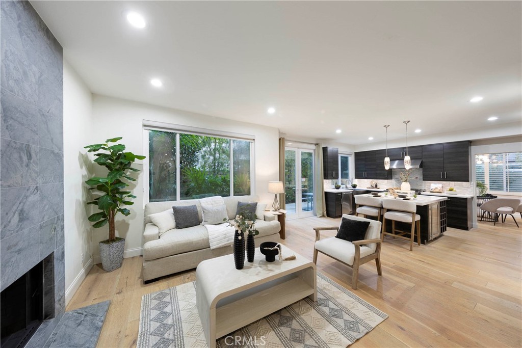 43 Lessay Newport Coast, CA 92657 - Photo 13 of 29 Kitchen overlooks spacious family room with access to beautifully maintained backyard.